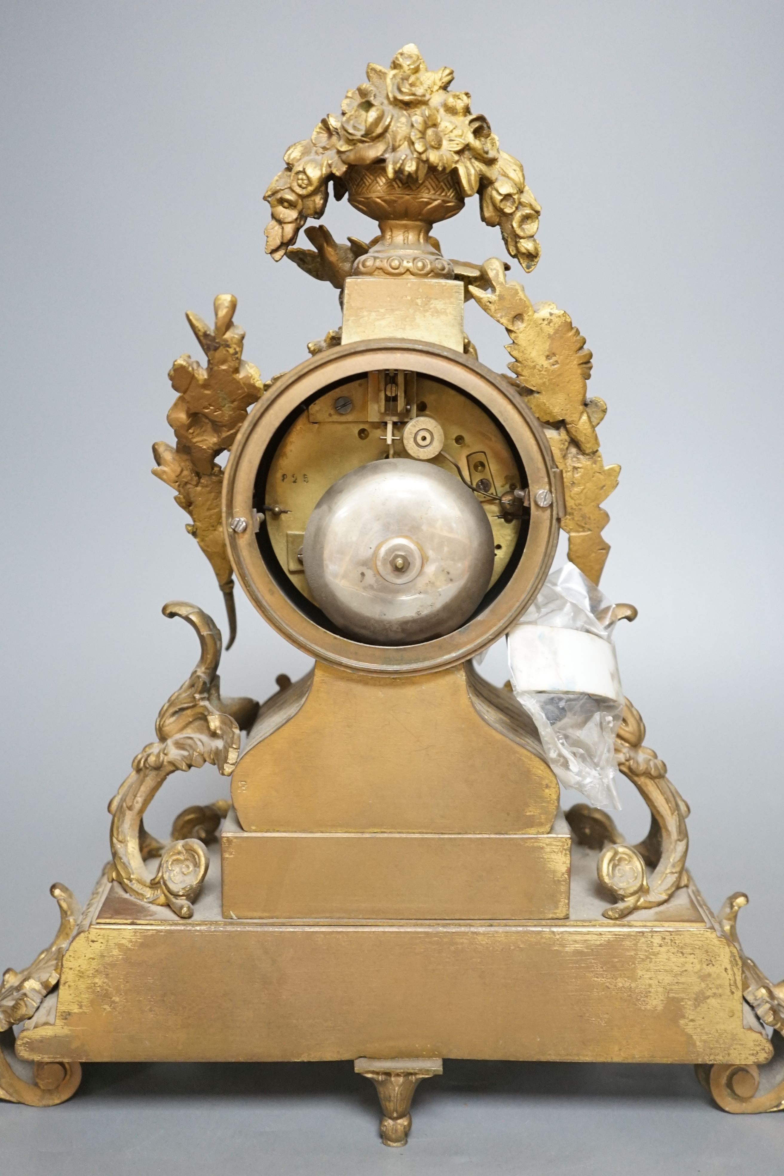 A 19th century French Sevres style porcelain and ormolu mantel clock - 35cm tall